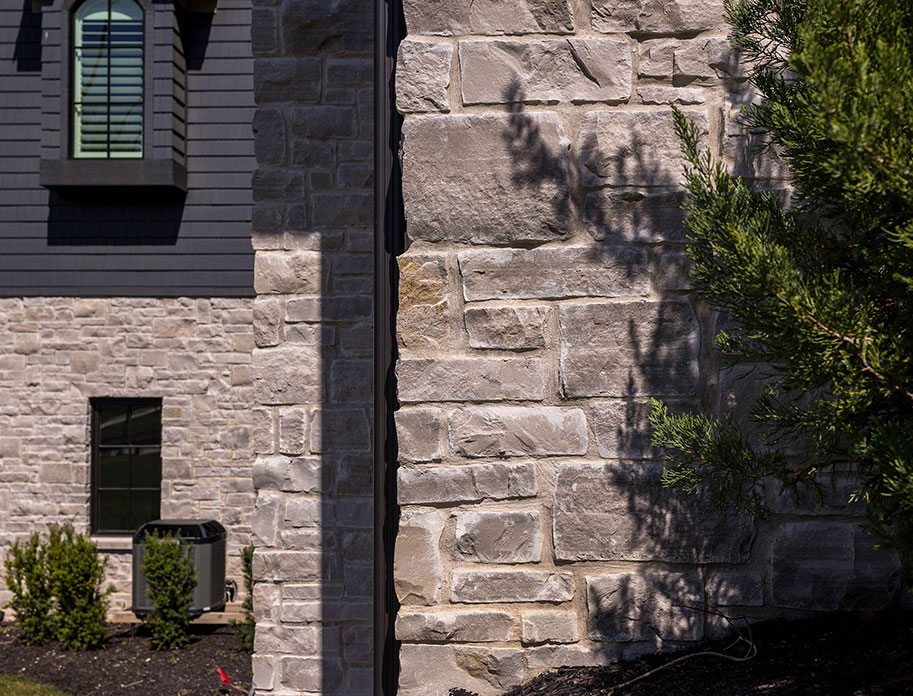 Close up of an exterior of a home with a fine Rademann Stone veneer.