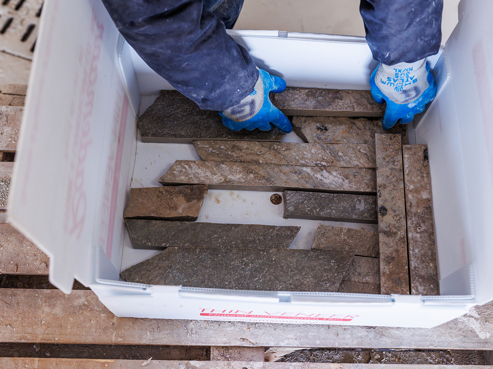 Placing Rademann stone in a box